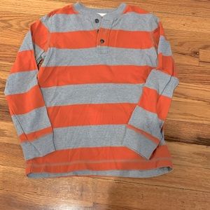 Kids long sleeve orange and grey striped henley. Size Small. Great condition.